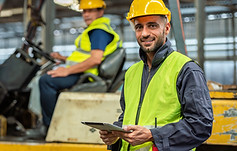 Manufacturing Plant Worker using SQUEAKS to better communicate with team members